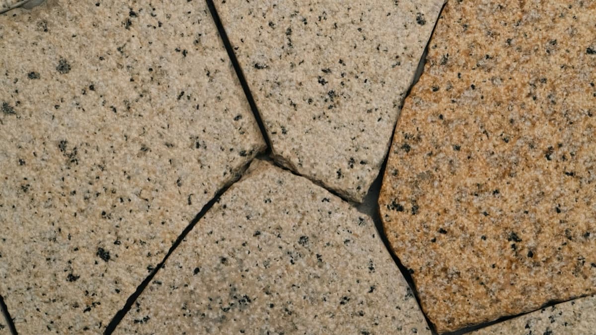 Speckled tan and orange granite tiles